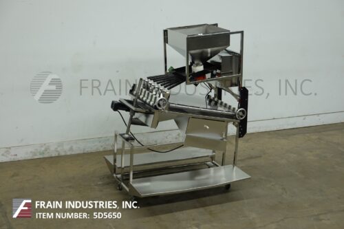 Photo of Eisai Pharmaceutical Tab/Cap Ins. automatic thickness and length sorting system