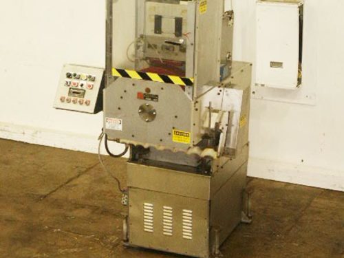 Photo of Universal Labeling Systems Capper Neck Bander 6000