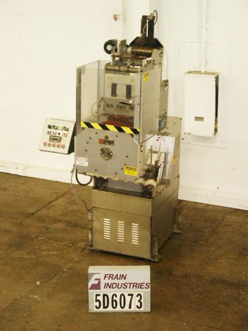 Photo of Universal Labeling Systems Capper Neck Bander 6000